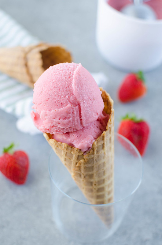 Homemade Strawberry Sherbet - you will never buy store-bought sherbet after trying this recipe! Sweet, creamy, and the perfect summer treat. So easy and only 4 ingredients! 