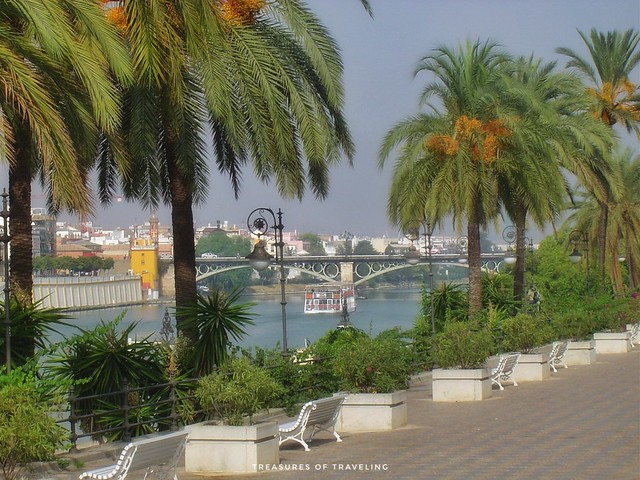 The Guadalquivir Canal separates the central part of Seville from the Triana Neighborhood. This area is referred to as the riverside promenade. This river walk area is generally filled with people relaxing and hanging out with friends as well as joggers a