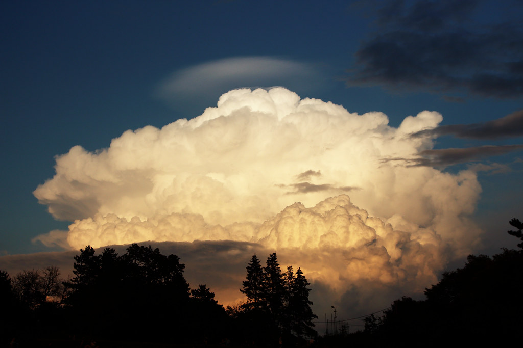 Cumulonimbus with stationary cloud and pileus