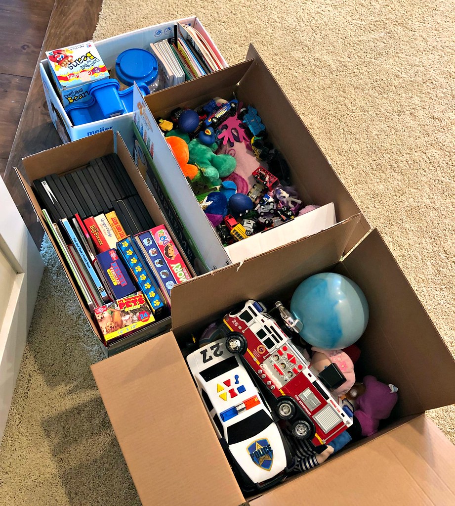 boxes of toys and games to donate