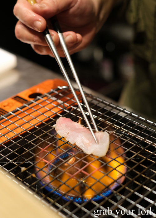 Searing the Kumamoto snapper over gas flame for our omakase at Jizakana in Cammeray, Sydney