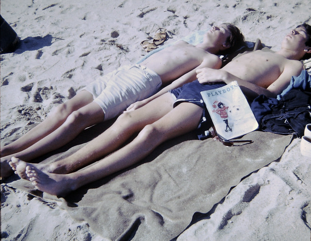 Found Photo - Two Teenagers on Beach (with Playboy Magazine).