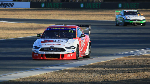 ipswich queensland raceway qld australia podium jamie whincup virgin supercars triple eight 88 888 zb holden commodore chev will davison milwaukee 23 red ford mustang gt v8 chaz mostert supercheap tickford motor racing pass race speed car cars hottie track practice pole position times timing hard competition competitive event saloon sports racer driver mechanic engine oil petrol build fast faster fastest grid circuit drive helmet marshal starter sponsor number class motorsport classic sunset shadows star