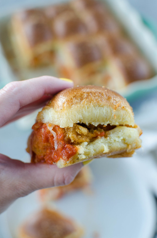 Chicken Parmesan Sliders - hawaiian rolls layered with crispy chicken strips, marinara, 2 kinds of cheeses, and topped with a garlicky butter glaze! Easy weeknight dinner or perfect for a party.