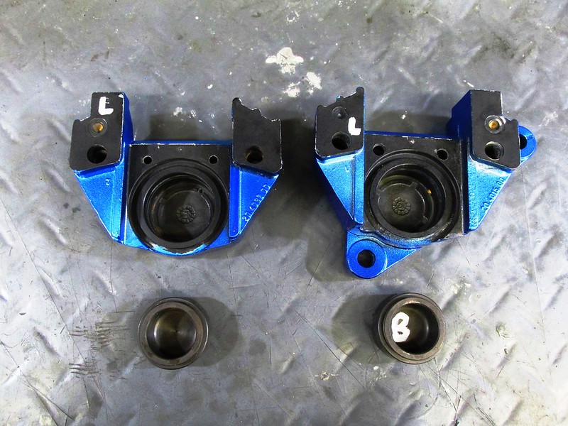 Caliper Halves With Matching Pucks ("B" Goes With "Brembo" Labeled Caliper Half)