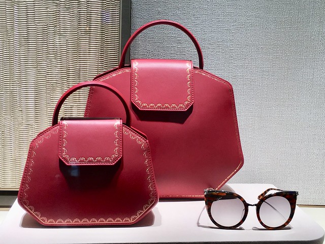 Cartier bag and sunglasses