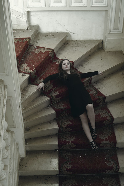Lying on giant stairs