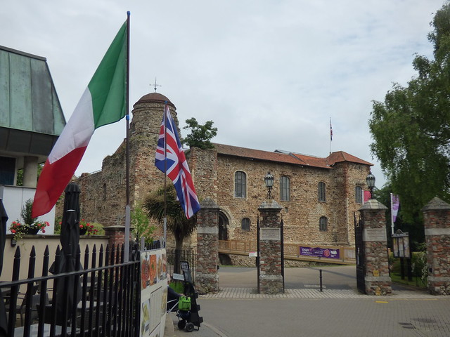 Colchester Castle in Castle Park, Colchester - Italian and British flags