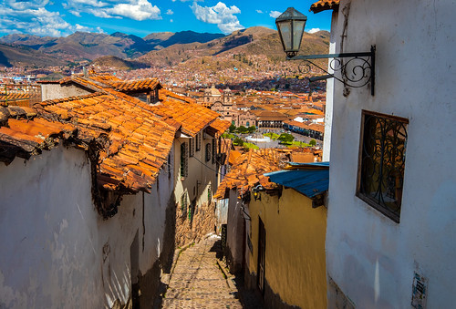 cusco cuzco peru city cityscape clouds terracotta latinamerica southamerica street houses