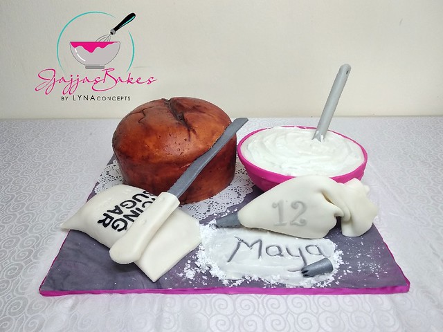 Cake from Lydia Nabayunga of JjajjasBakes by LYNAconcepts