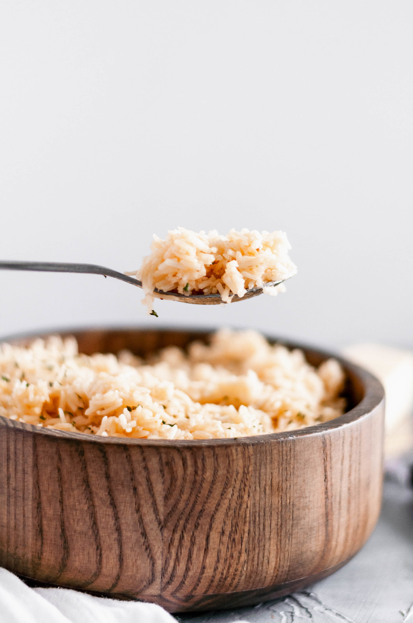 Looking for a quick and simple side dish? This Garlic Parmesan Rice only requires a handful of ingredients and comes together super easily.