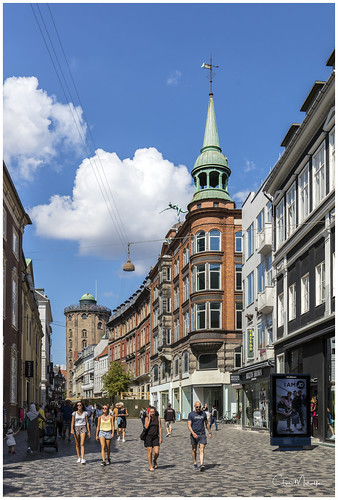 copenhagen denmark roundtower købmagergade people shops cobblestones streetscene mercury clouds bluesky