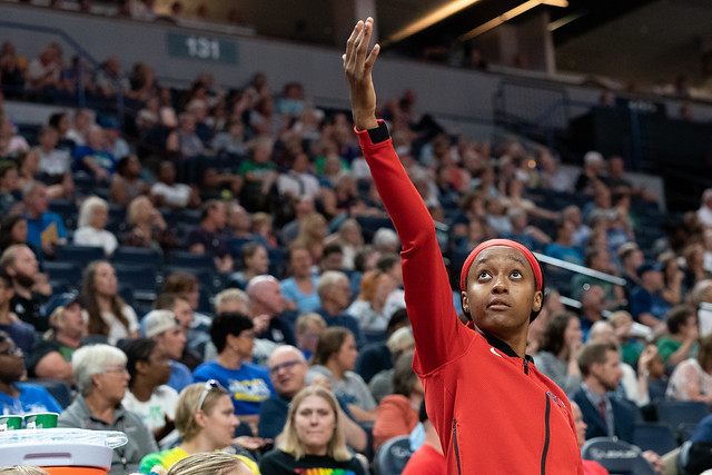 Shatori Walker-Kimbrough cheers for the Mystics from the sidelines