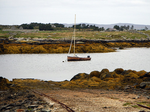 An inner channel with a boat just after Maghery Beach in Ireland