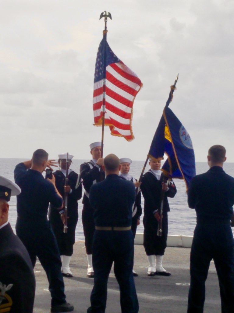 Color Guard on an aircraft carrier. Photo by howderfamily.com; (CC BY-NC-SA 2.0)