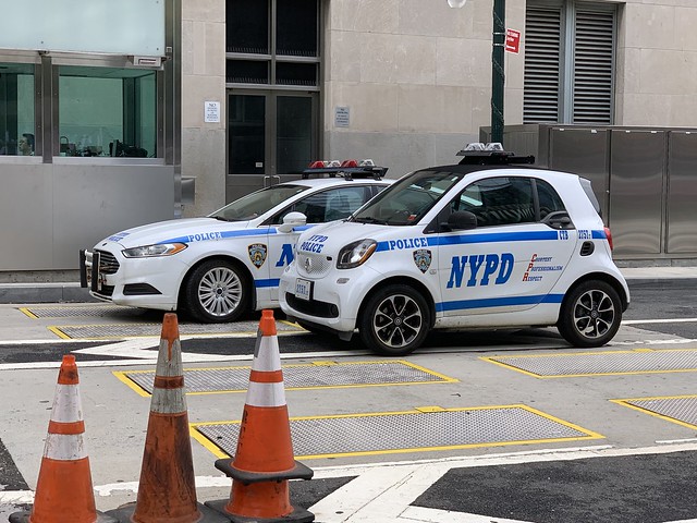 NYPD Ford Fusion and Smart Car