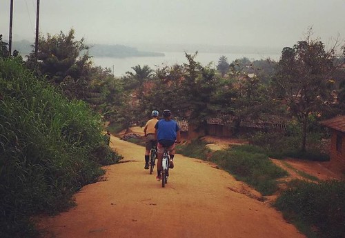 John and Mike biking in Kindu