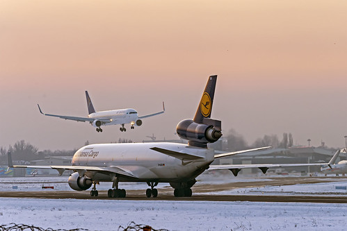 aircraft airplane airliner ala airport jet boeing 7673ky p4keb runway uaaa landing lufthansa cargo md11f dalcb sunset winter snow