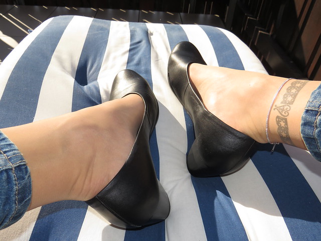 enjoying a sunny warm evening on the balcony, wearing my office pumps, nylons and jeans