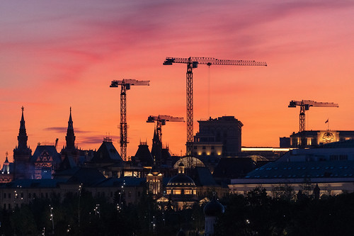 moscow russia sunset dusk glow sky city cityscape silhouette cranes afterglow