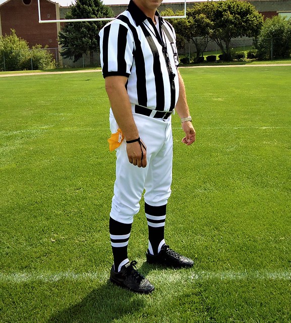 Vintage NFL referee uniform with stirrup socks.