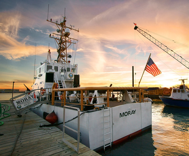 U.S. Coast Guard Cutter Moray at sunset.