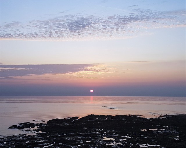 Sunrise Over Creswell Beach Rocks