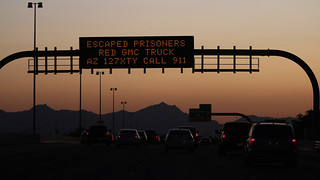 Freeway Sign - Fugitive Couple in Arizona Still on the Loose - 7359zC