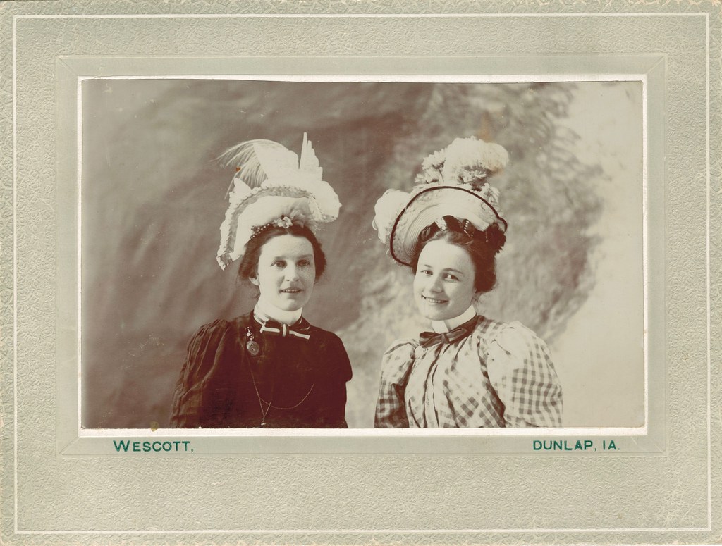 Two women with fancy hats | It's hard to imagine walking aro… | Flickr