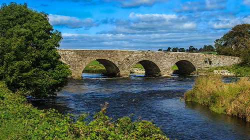1770 bridge landscape outdoor suir arch green humpback ireland limestone riverbank trees tipperary newcastle river