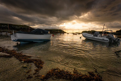 after the storm trearddur bay boats sunset beach north wales holy island anglesey
