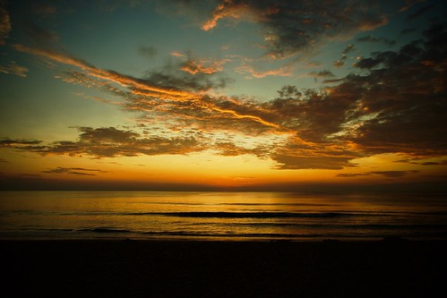 sunrise ocean clouds water