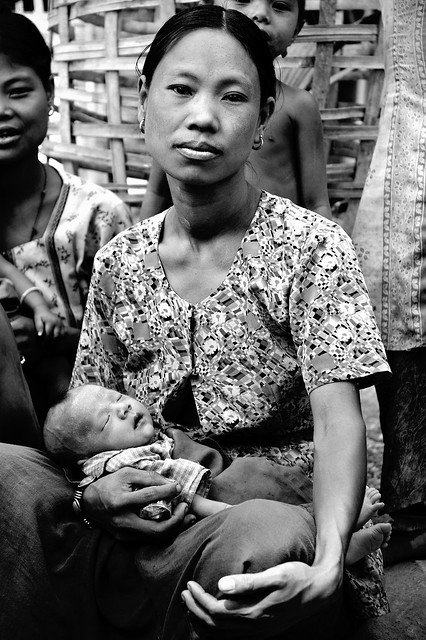 Young mother with her newborn baby in a Chin village - Myanmar