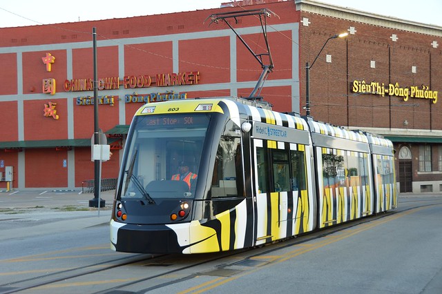 The Kansas City Streetcar Caterpillar has come out of the Barn and is taking a loop lead track to enter the system for the day.