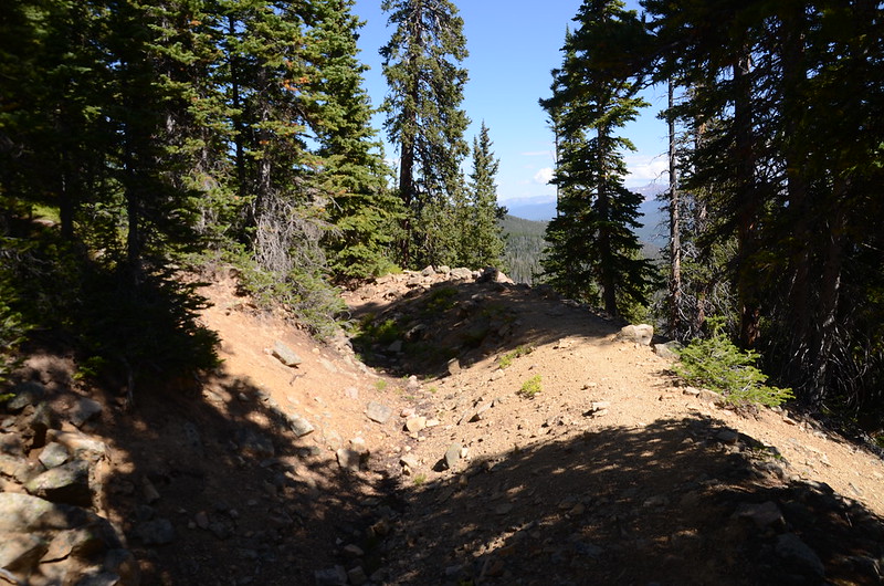 The trail travels through the edge of the ridge