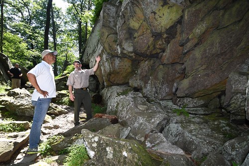 Photo of Lieutenant Governor Rutherford and park ranger in front of rock formation