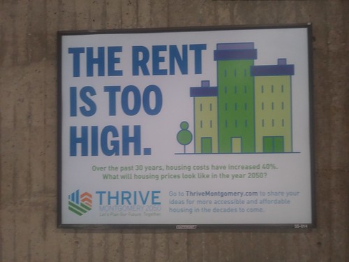 The rent is too high.  Billboard in the Silver Spring Metrorail Station.  Thrive Montgomery
