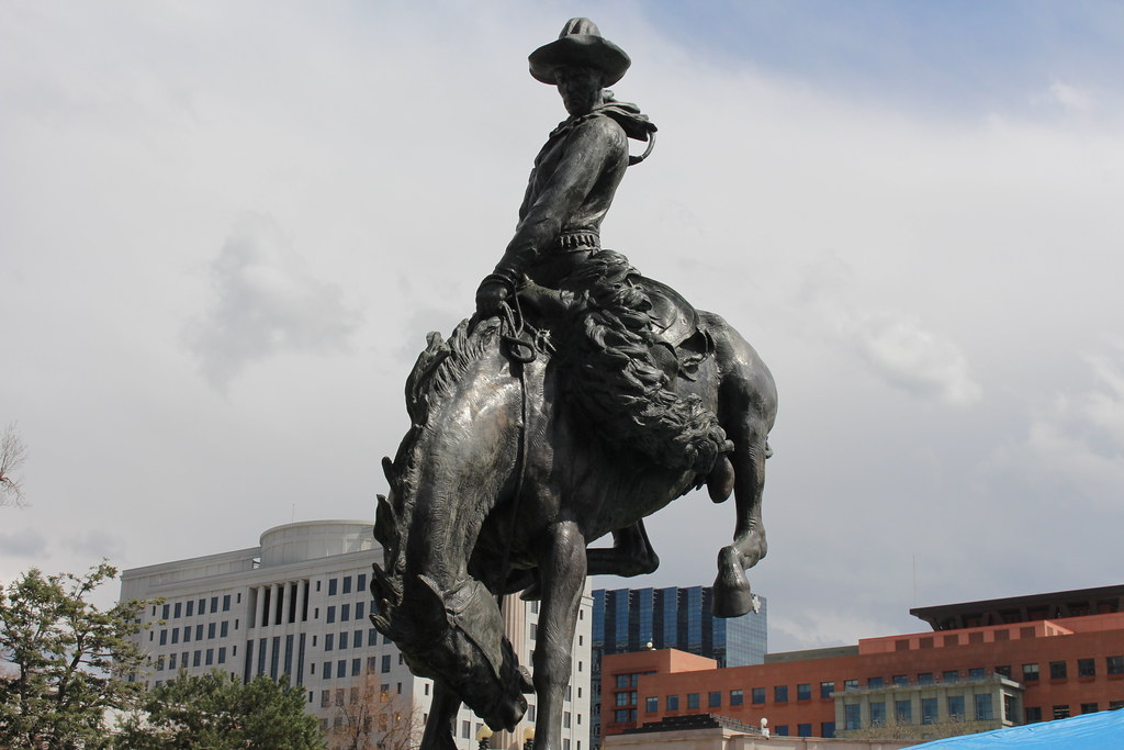 The statue of a cowboy in downtown Denver