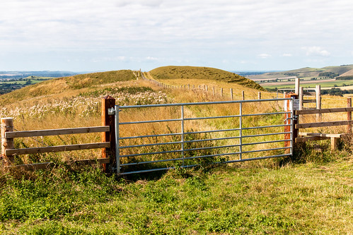 wiltshire landscape oare hill hillfort rampart bank ditch promontory hilltop panorama gate fence stile footpath northwessex downs aonb