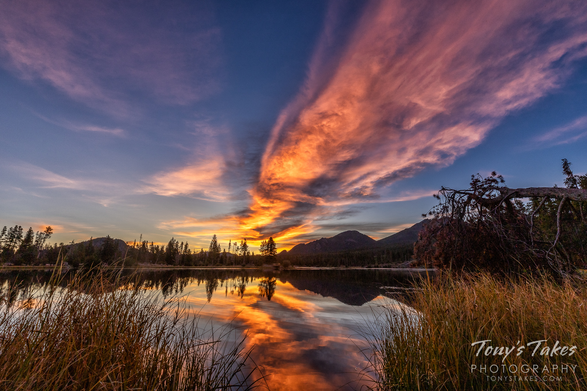 A beautiful sunrise with reflections on Sprague Lake in Rocky Mountain National Park. (© Tony’s Takes)