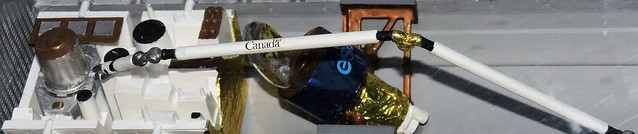 Model of the Canadarm within the space shuttle Discovery