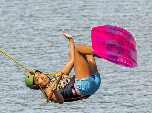 Girl on a wakeboard in flight from a springboard   XOKA6532ss