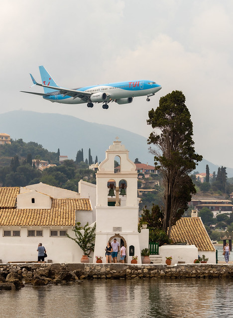 Airplane flying just above Vlacherna Monastery - Corfu