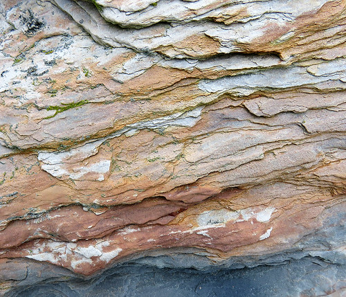 Wavy slate-like rocks resemble a Chinese painting at a beach near Galley Head in Ireland