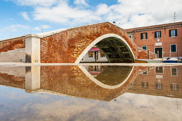 Bridge in Murano with reflection