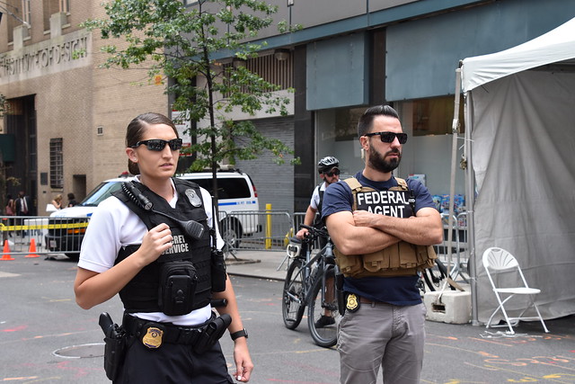 A DSS agent coordinates with a USSS special agent to secure delegate arrivals at UNGA in NYC, Sept. 23, 2019.