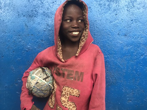 ball afrique smile young sports portrait blue football sport boy soccer africa kigali rwanda