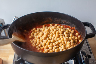 add the tomatoes and chickpeas