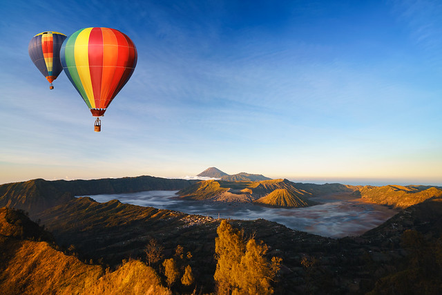 Colorful hot-air balloon flying over Mt. Bromo