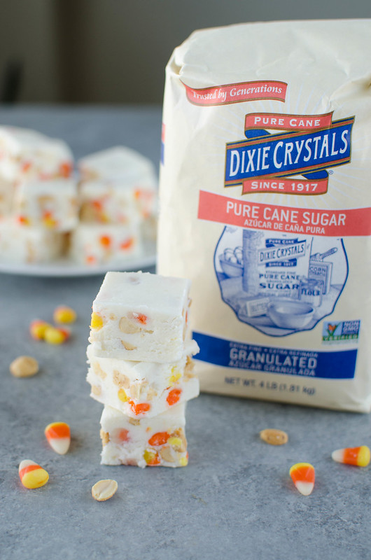 Candy Corn Fudge - white chocolate fudge with mini candy corn and salted peanuts. The perfect sweet and salty treat for Halloween!